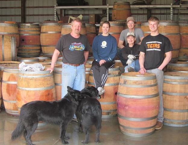 Our family in Minneapolis, MN surrounded by our premium wine barrels